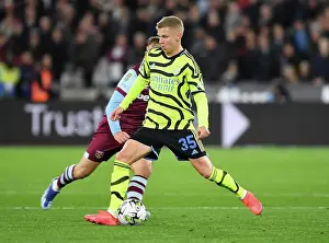 West Ham United V Arsenal - Carabao Cup 2023-24 Prints: Arsenal's Zinchenko Takes Charge: Carabao Cup Battle at London Stadium