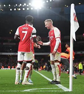 Arsenal's Zinchenko, Trossard, and Saka Celebrate Goals Against Burnley in 2023-24 Premier League