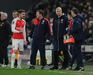 15/16 Hull City V Arsenal FA Cup Prints: Arsene Wenger and Aaron Ramsey Consult Arsenal's Physio during Hull City FA Cup Match