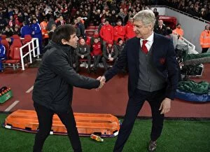 Images Dated 24th January 2018: Arsene Wenger and Antonio Conte: A Pre-Match Handshake Before the Arsenal v Chelsea Carabao Cup