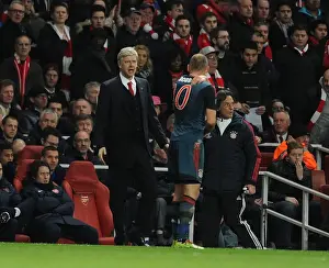 Arsenal V Bayern Munich 2013-14 Prints: Arsene Wenger and Arjen Robben: A Tense Moment Between Arsenal and Bayern Munich in the UEFA Champions League