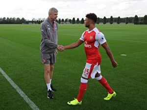 Arsene Wenger Arsenal Manager and Alex Oxlade-Chamberlain (Arsenal)