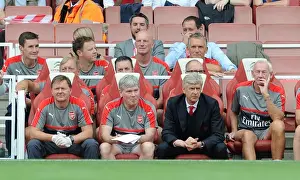 Arsene Wenger the Arsenal Manager on the bench with Gary Lewin (Physio), Pat Rice