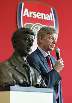 Arsene Wenger the Arsenal Manager with his bust