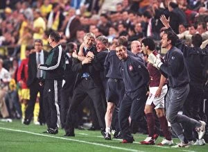 Arsene Wenger the Arsenal Manager celebrates with his Assistant Pat Rice at the final whistle