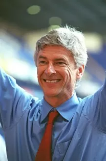 Images Dated 7th April 2005: Arsene Wenger the Arsenal Manager celebrates winning the league
