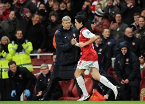 Arsene Wenger the Arsenal Manager congratulates Samir Nasri (Arsenal) on his 2nd goal