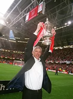 Trophies Collection: Arsene Wenger the Arsenal Manager with the FA Cup Trophy