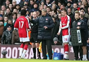 Images Dated 8th February 2009: Arsene Wenger the Arsenal Manager gives Alex Song