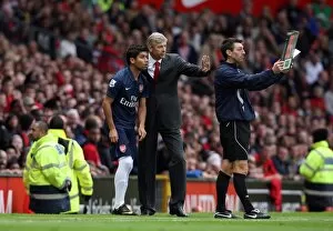Eduardo Collection: Arsene Wenger the Arsenal Manager gives Eduardo