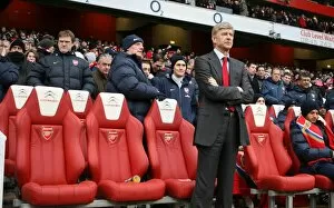 Images Dated 9th January 2010: Arsene Wenger the Arsenal Manager with JK (Masseur) to his right. Arsenal 2: 2 Everton