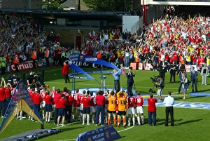 Images Dated 25th September 2002: Arsene Wenger the Arsenal Manager lifts the Premiership Trophy