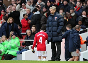 Arsenal v Aston Villa 2009-10 Collection: Arsene Wenger the Arsenal Manager looks on as Cesc Fabregas (Arsenal)