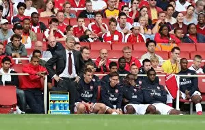 Images Dated 12th August 2008: Arsene Wenger the Arsenal Manager with Lucazade bottles
