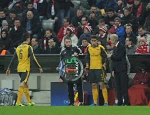 Bayern Munich v Arsenal 2016-17 Collection: Arsene Wenger the Arsenal Manager oversees the substitution of Laurent Koscielny