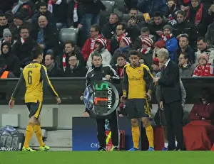 Arsene Wenger the Arsenal Manager oversees the substitution of Laurent Koscielny
