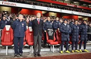 Arsenal v Bolton 2009-10 Collection: Arsene Wenger the Arsenal Manager and Pat Rice his Assistant satnd for a minutes silence following