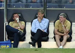 Arsene Wenger Arsenal Manager with Pat Rice (Assistant Manager) and Gary Lewin (Physio)