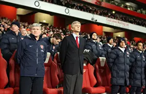 Arsene Wenger the Arsenal Manager and Pat Rice his Assistant satnd for a minutes silence following the disater in Haiti. Arsenal 4: 2 Bolton Wanderers. Barclays Premier League. Emirates Stadium, 20 / 1 / 10. Credit : Arsenal Football Club