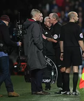 Arsene Wenger the Arsenal Manager and Referee Mike Dean. West Bromwich Albion 1: 1 Arsenal