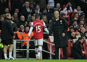 Arsenal v Manchester City 2012-13 Collection: Arsene Wenger the Arsenal Manager shakes hands with Alex Oxlade-Chamberlain (Arsenal)