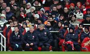 Arsenal V Everton 2009-10 Prints: Arsene Wenger the Arsenal Manager sits in the dug out with Pat Rice (Assistant)