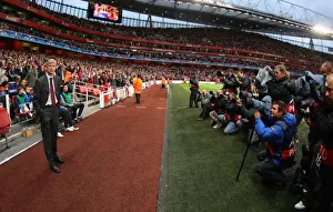 Arsenal V Celtic 2009-10 Prints: Arsene Wenger the Arsenal Manager stands infront of the photographers