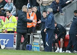 Wigan Athletic v Arsenal 2008-09 Collection: Arsene Wenger the Arsenal Manager and Steve Bruce the