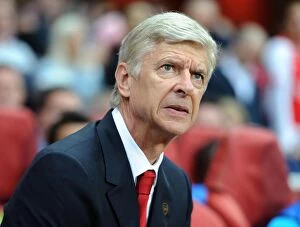 Images Dated 27th August 2014: Arsene Wenger: Arsenal Manager in UEFA Champions League Showdown Against Besiktas (2014)