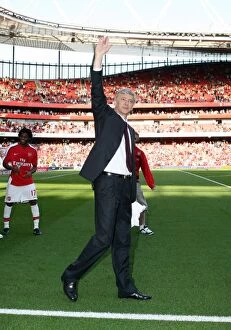 Arsenal v Stoke City 2008-09 Collection: Arsene Wenger the Arsenal Manager waves to the fans after the match
