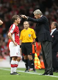 Arshavin Andrey Prints: Arsene Wenger Celebrates with Andrey Arshavin after Arsenal's 2-0 Win over Olympiacos in the UEFA Champions League
