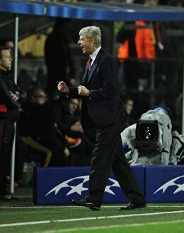 Images Dated 6th November 2013: Arsene Wenger Celebrates Arsenal's Victory Over Borussia Dortmund in the UEFA Champions League
