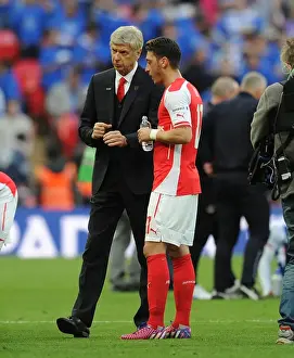 Reading V Arsenal FA Cup Semi Final 2014/15 Prints: Arsene Wenger Consulting with Mesut Ozil during Arsenal's FA Cup Semi-Final vs