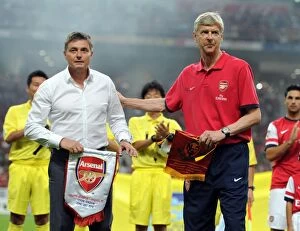 Nagoya Grampus v Arsenal 2013-14 Collection: Arsene Wenger and Dragan Stojkovic Exchange Pennants Before Nagoya Grampus vs. Arsenal Match, 2013