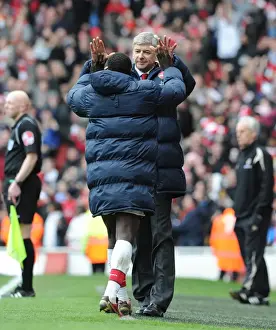 Arsene Wenger and Emmanuel Eboue: Celebrating Arsenal's Victory Against Wolverhampton Wanderers, FA Premier League, 2010