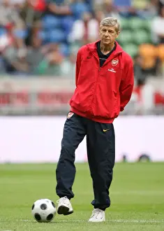 Arsenal V Seville Prints: Arsene Wenger Faces Off Against Seville at the Amsterdam Tournament: A 1:1 Battle