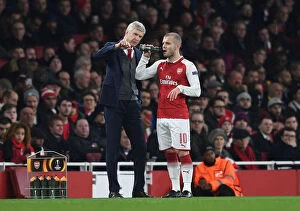 Images Dated 15th March 2018: Arsene Wenger Giving Instructions to Jack Wilshere: Arsenal vs AC Milan, UEFA Europa League 2018