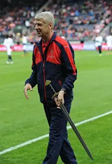 Viking FK V Arsenal 2016-17 Prints: Arsene Wenger Honored with Viking Sword before Arsenal's Pre-Season Match in Norway (2016)
