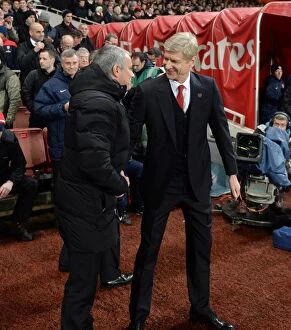 Images Dated 23rd December 2013: Arsene Wenger and Jose Mourinho: The Iconic Pre-Match Handshake at Arsenal vs Chelsea (2013-14)