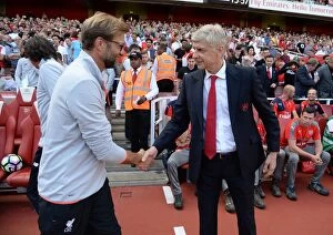 Images Dated 14th August 2016: Arsene Wenger and Jurgen Klopp: A Premier League Rivalry Unfolds - Arsenal vs. Liverpool, 2016-17
