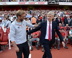 Images Dated 14th August 2016: Arsene Wenger and Jurgen Klopp's Pre-Match Handshake: Arsenal vs. Liverpool, Premier League 2016-17