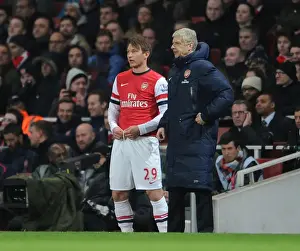 Arsenal V Swansea City 2013-14 Prints: Arsene Wenger and Kim Kallstrom: Arsenal's Midfield Duo in Action against Swansea City (2013-14)