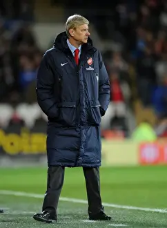 Arsene Wenger Leads Arsenal Against Cardiff City in the 2013-14 Premier League