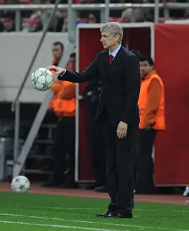 Olympiacos V Arsenal 2011-12 Prints: Arsene Wenger Leads Arsenal Against Olympiacos in UEFA Champions League (December 2011)