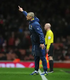 Arsene Wenger Leads Arsenal Against Queens Park Rangers in Premier League Clash (December 2014)