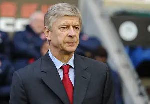 Arsene Wenger Leads Arsenal Against Wigan Athletic in Premier League Clash (2011-12)