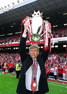 Arsene Wenger Lifts the FA Premiership Trophy: Arsenal's Historic 4-3 Victory over Everton at Highbury, 2002