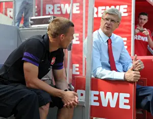 Cologne V Arsenal 2012-13 Prints: Arsene Wenger and Lukas Podolski: A Reunion at the Cologne Pre-Season Friendly (2012-13)