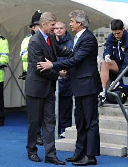 Manchester City v Arsenal 2013-14 Collection: Arsene Wenger and Manuel Pellegrini: A Meeting of Minds - Manchester City vs