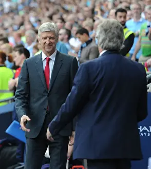Manchester City V Arsenal 2105-16 Prints: Arsene Wenger and Manuel Pellegrini's Pre-Match Handshake: Manchester City vs